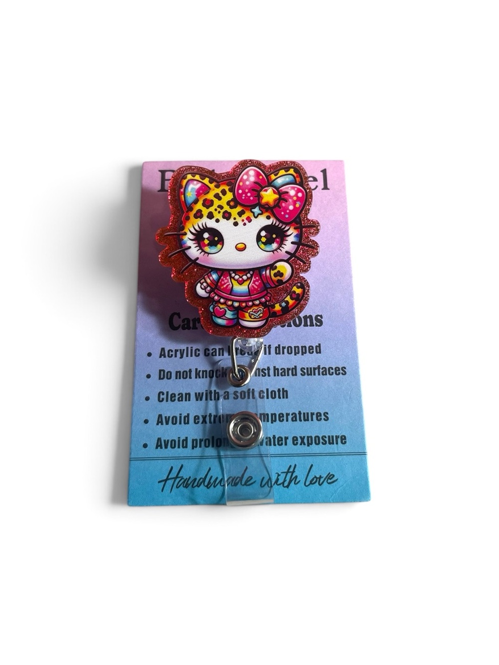 Hello Kitty Leopard Print Bow Badge Reel - Pink, Yellow, Red